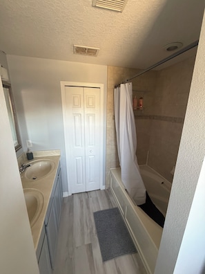 Hair dryer, towels, soap, shampoo