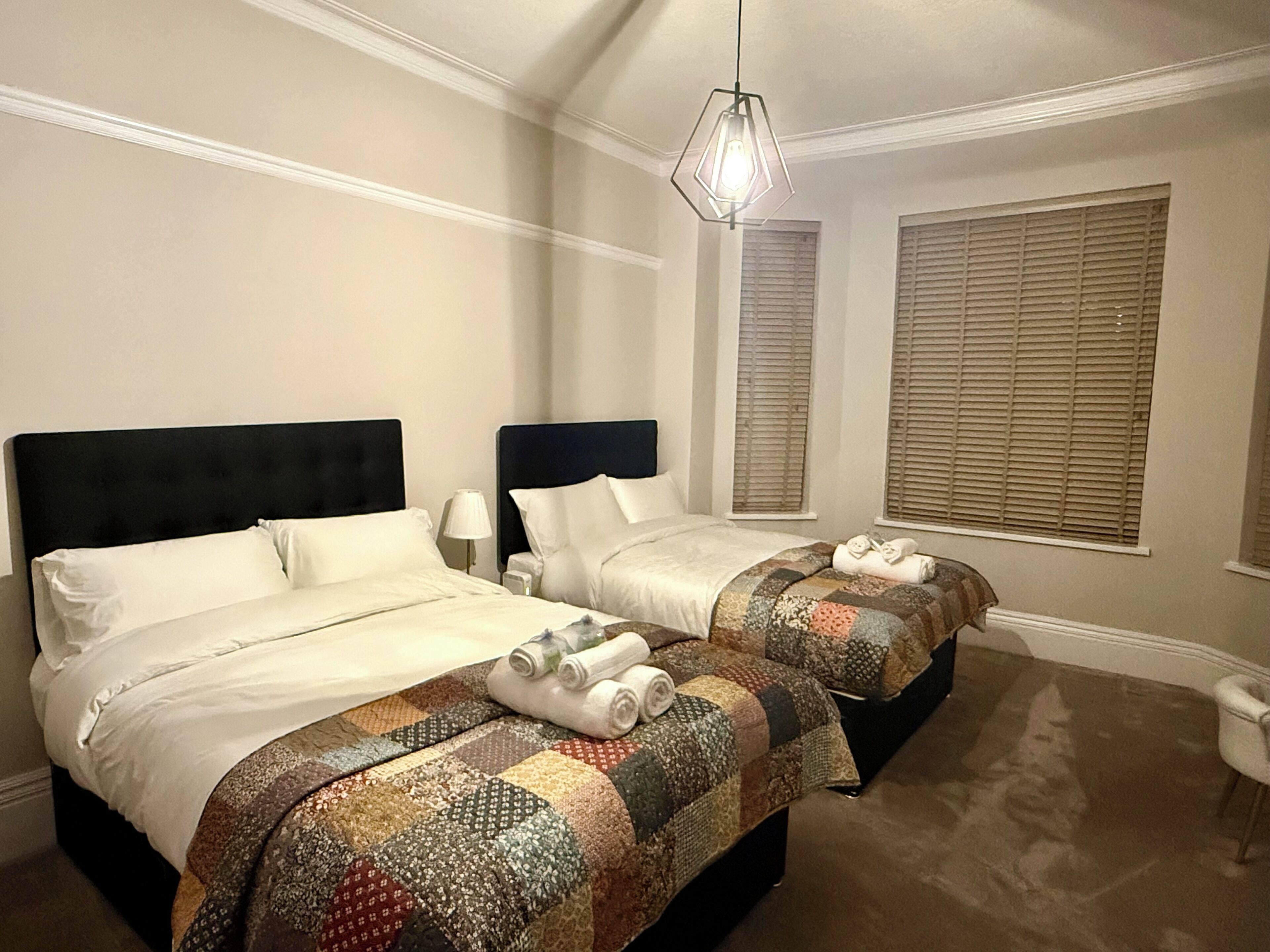 4 bedrooms, desk, iron/ironing board, travel cot