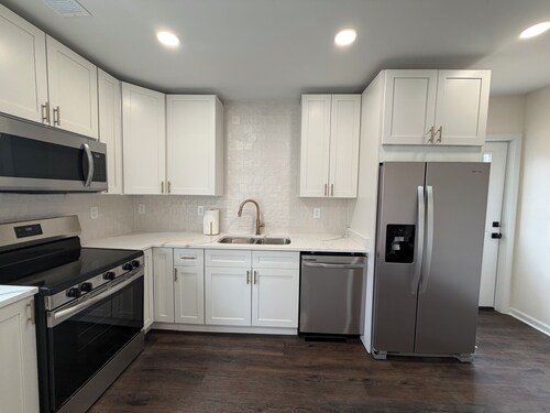 Relax with the family at this historic home that has been brought back to life