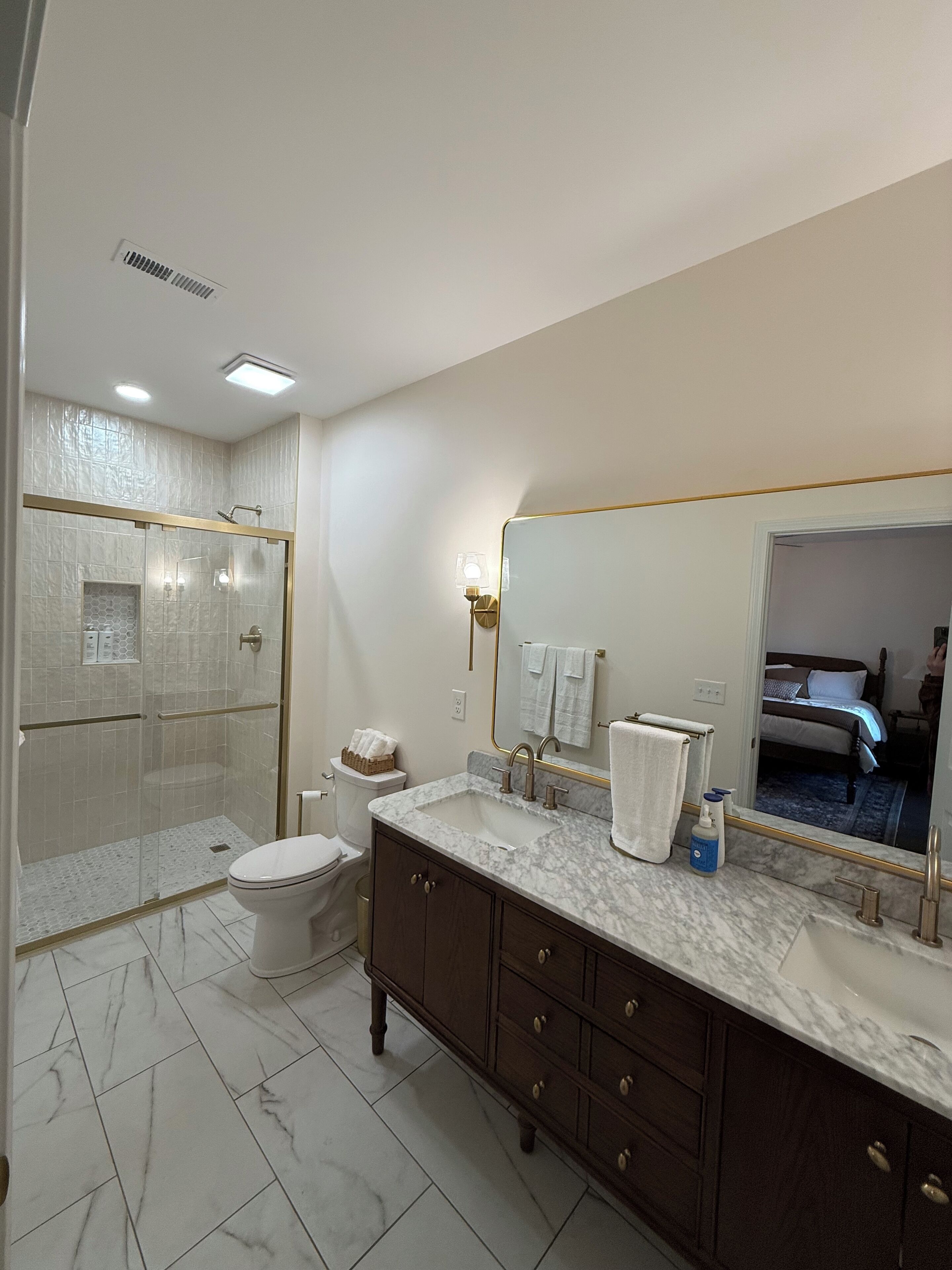 Shower, towels, soap, toilet paper