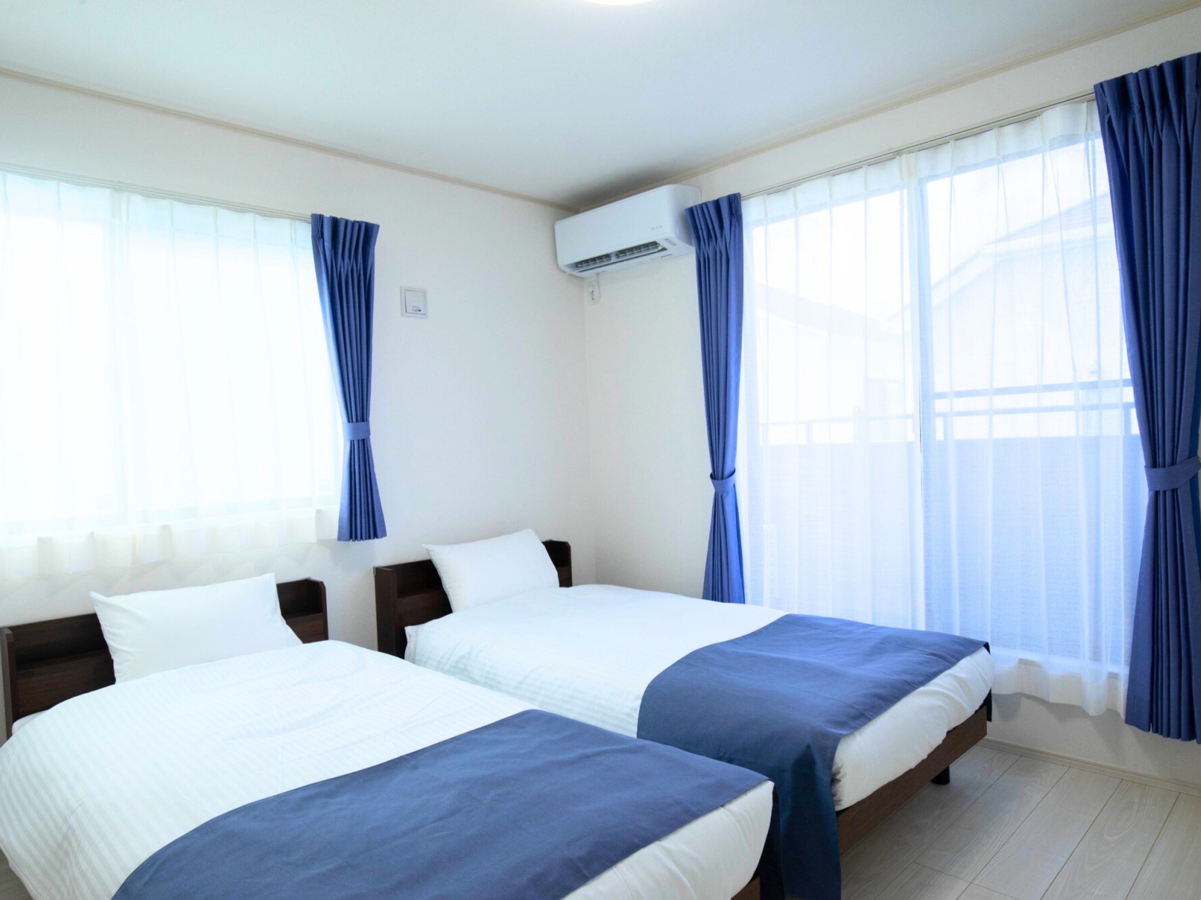 Family Apartment, Balcony, Garden View | Desk, laptop workspace, iron/ironing board, free WiFi