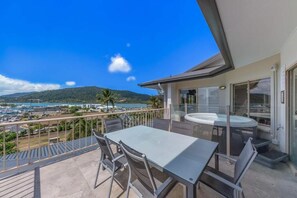 Deluxe Apartment, Balcony, Sea View | Outdoor dining - Spa Haven 18A Top Floor Private Spa (Airlie Beach)