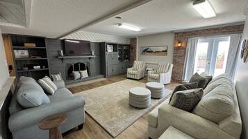 Smart TV, fireplace, books