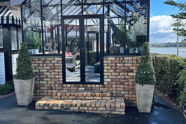 La Belle Maison Beautiful Glasshouse with water views along with a 3 Bed Home