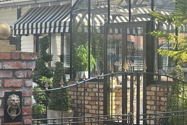 The Front Gates To La Belle Maison