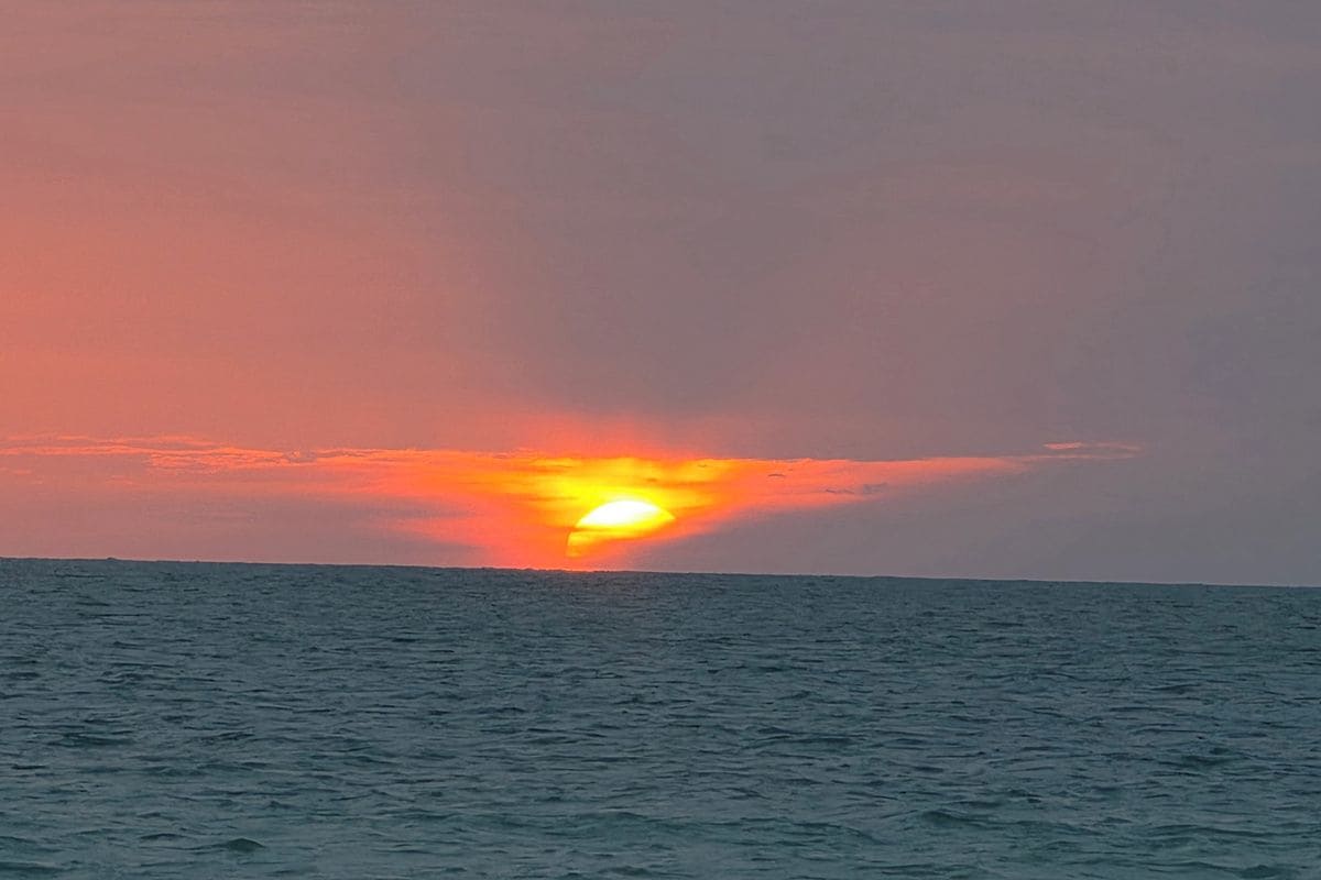 A sunset over a body of water.