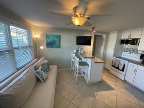 Bungalow, 1 Queen Bed with Sofa bed, Pets Allowed, Garden View | Living area - Southern PAG Beach House Bungalows (St. Pete Beach)