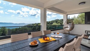 Outdoor dining - Ria with heated pool by Interhome (Trogir)