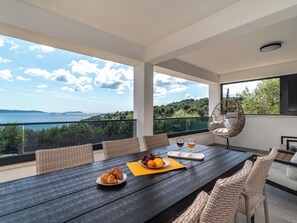 Outdoor dining - Ria with heated pool by Interhome (Trogir)