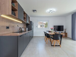 Fridge, oven, dishwasher, cookware/dishes/utensils - Ria with heated pool by Interhome (Trogir)