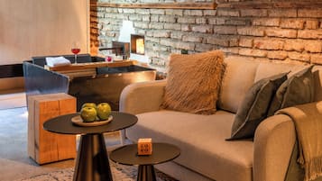 Classic Studio | Living area | 50-inch flat-screen TV with cable channels, Netflix, streaming services