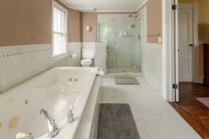 Jetted bath, hair dryer, towels, soap
