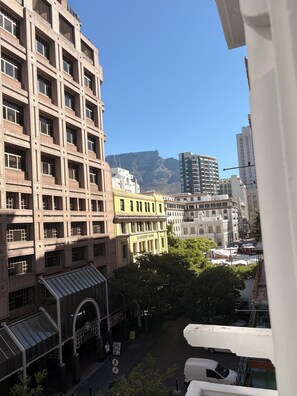 A cityscape with a prominent building labeled "Leadership House" and a mountain in the background. - Charming Heritage Studio in Cape Town CBD (Cape Town)