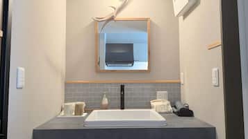 Hair dryer, bidet, towels, soap