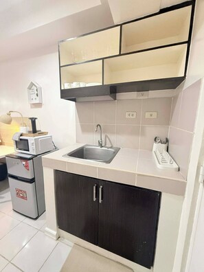 Condo, 1 Bedroom, Accessible | Private kitchen - Cozy Studio Condo With Stunning Tagaytay Views (Tagaytay)