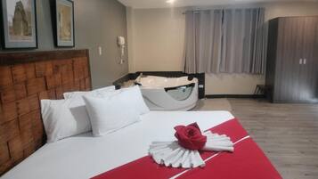 Deluxe Room, Mountain View | Desk, laptop workspace, blackout curtains, iron/ironing board