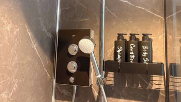 Shower, hair dryer, towels, soap