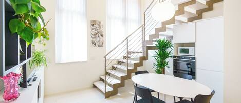 Apartamento, 2 quartos | Área de estar