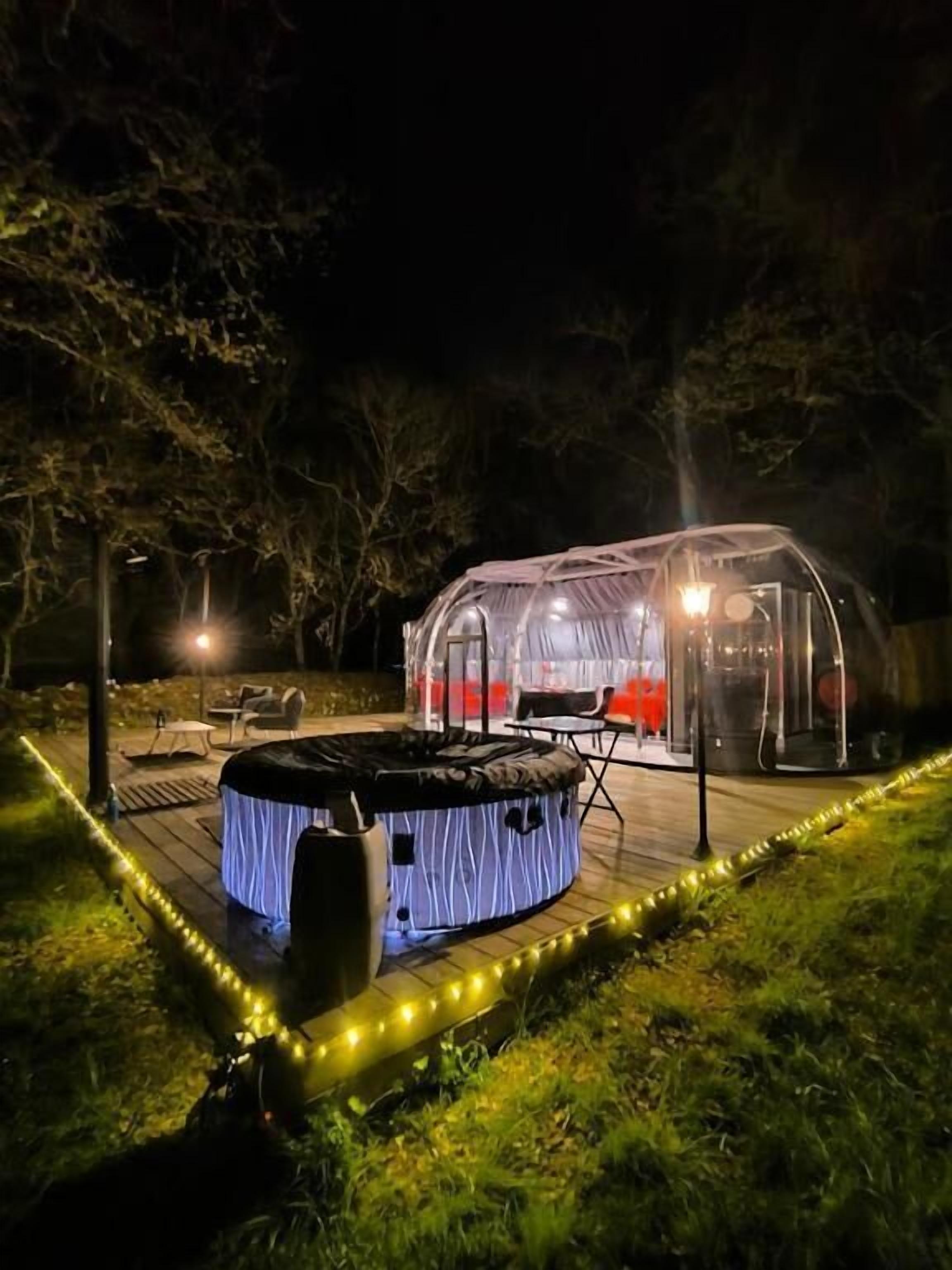 Tent, 1 kingsize bed, uitzicht op tuin | Outdoor spabad
