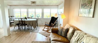 Seaside plot with private jetty, rowing boat & sunset