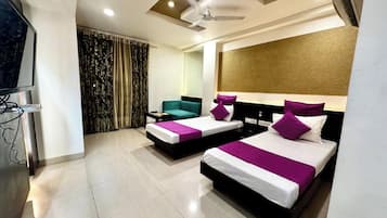 Deluxe Twin Room, Balcony, City View | In-room safe, desk, laptop workspace, iron/ironing board