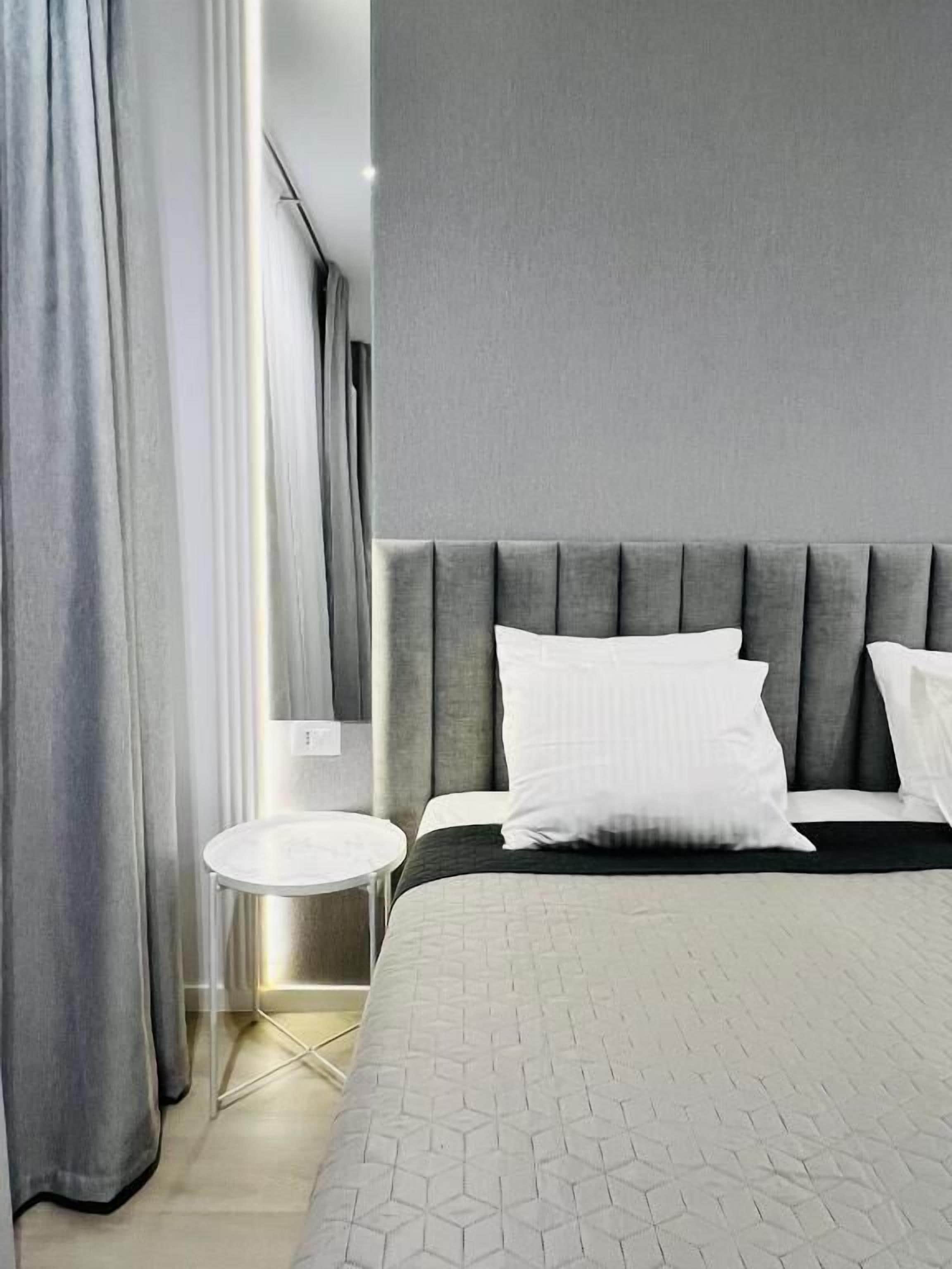 Departamento Deluxe, vista al patio | Artículos del minibar gratis, wifi gratis y ropa de cama 