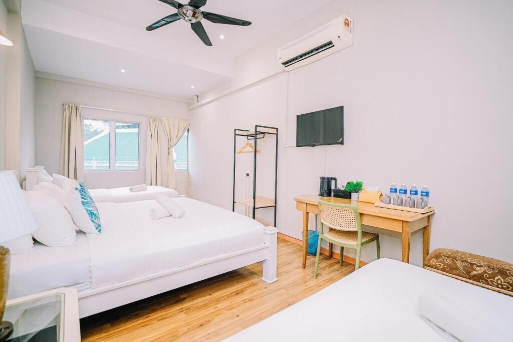 Habitación cuádruple Deluxe | Tabla de planchar con plancha y wifi gratis