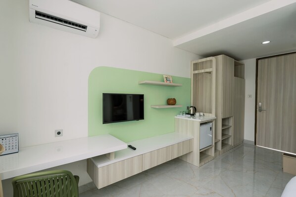 Apartamento Deluxe | Zona de estar