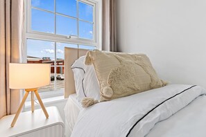 2 dormitorios, tabla de planchar con plancha, wifi gratis y ropa de cama