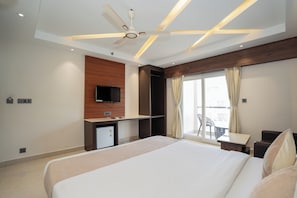 Deluxe Room | Desk, blackout drapes, soundproofing, free WiFi - Trayee International (Digha)