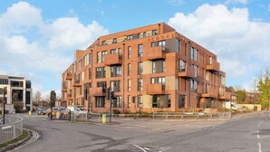 A modern multi-story building with a brick facade and large windows. - York Retreat • Shambles • Free Parking • Gym Access (York)