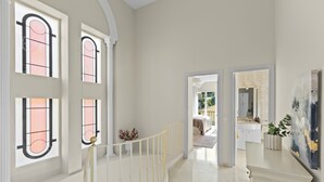 A spacious hallway with a marble floor, a white railing, and large windows with black frames. - Elegant Private Villa with Pool & Scenic View (Mijas)