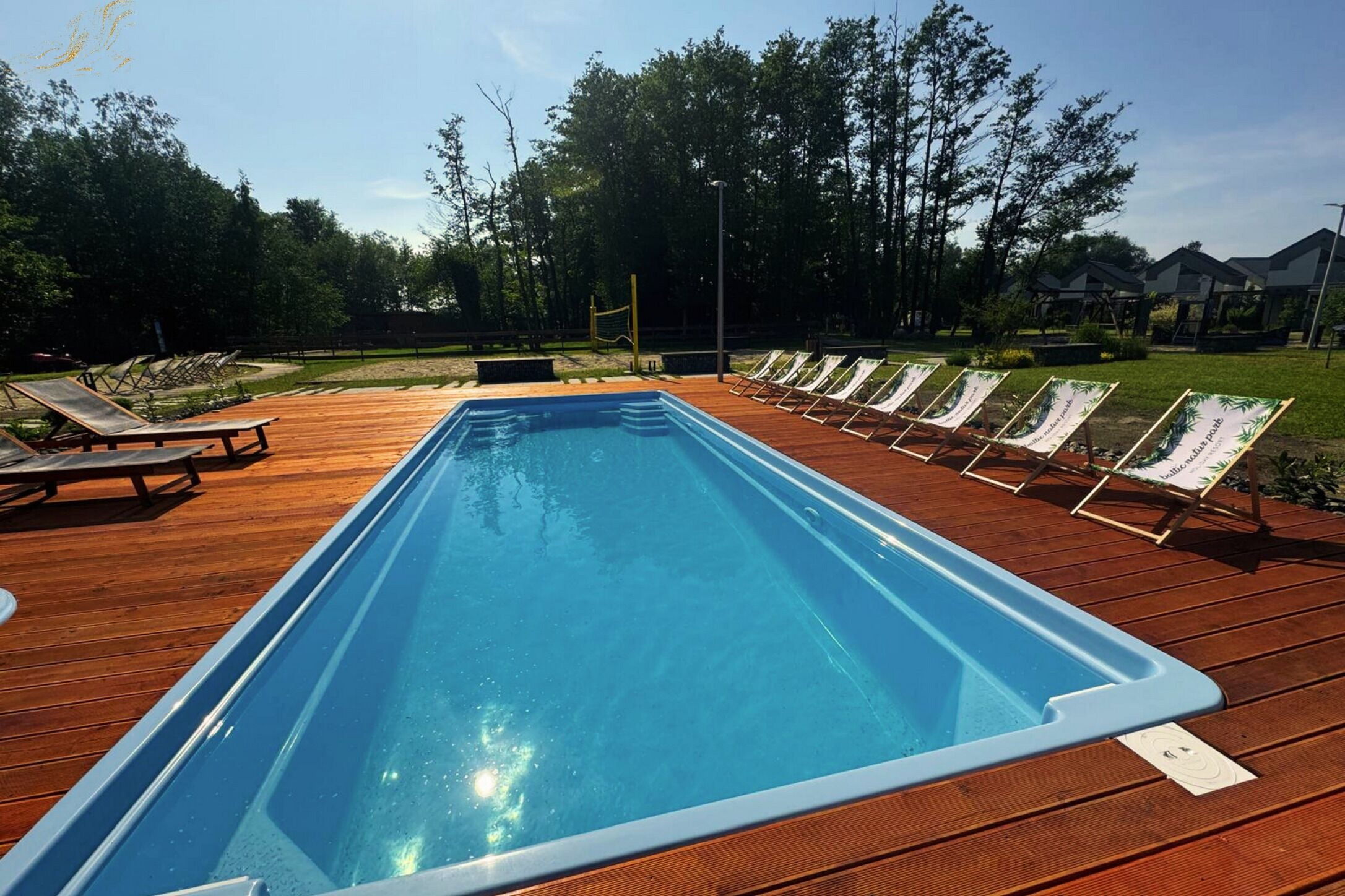 Seasonal outdoor pool, open 10:00 AM to 8:00 PM, pool umbrellas