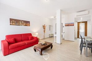 Living area - Exclusive Seaview Apartment in front of the beach (Alghero)