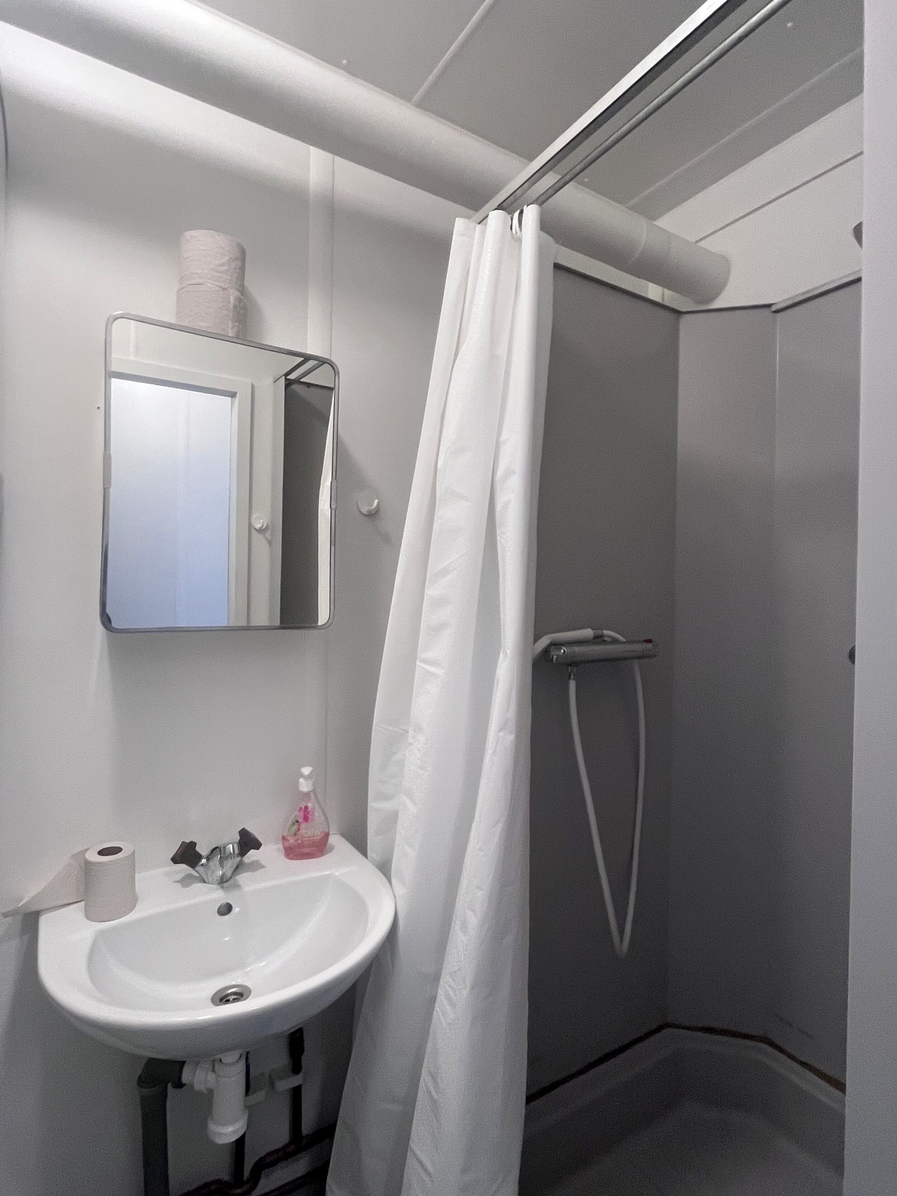 Shower, towels, toilet paper