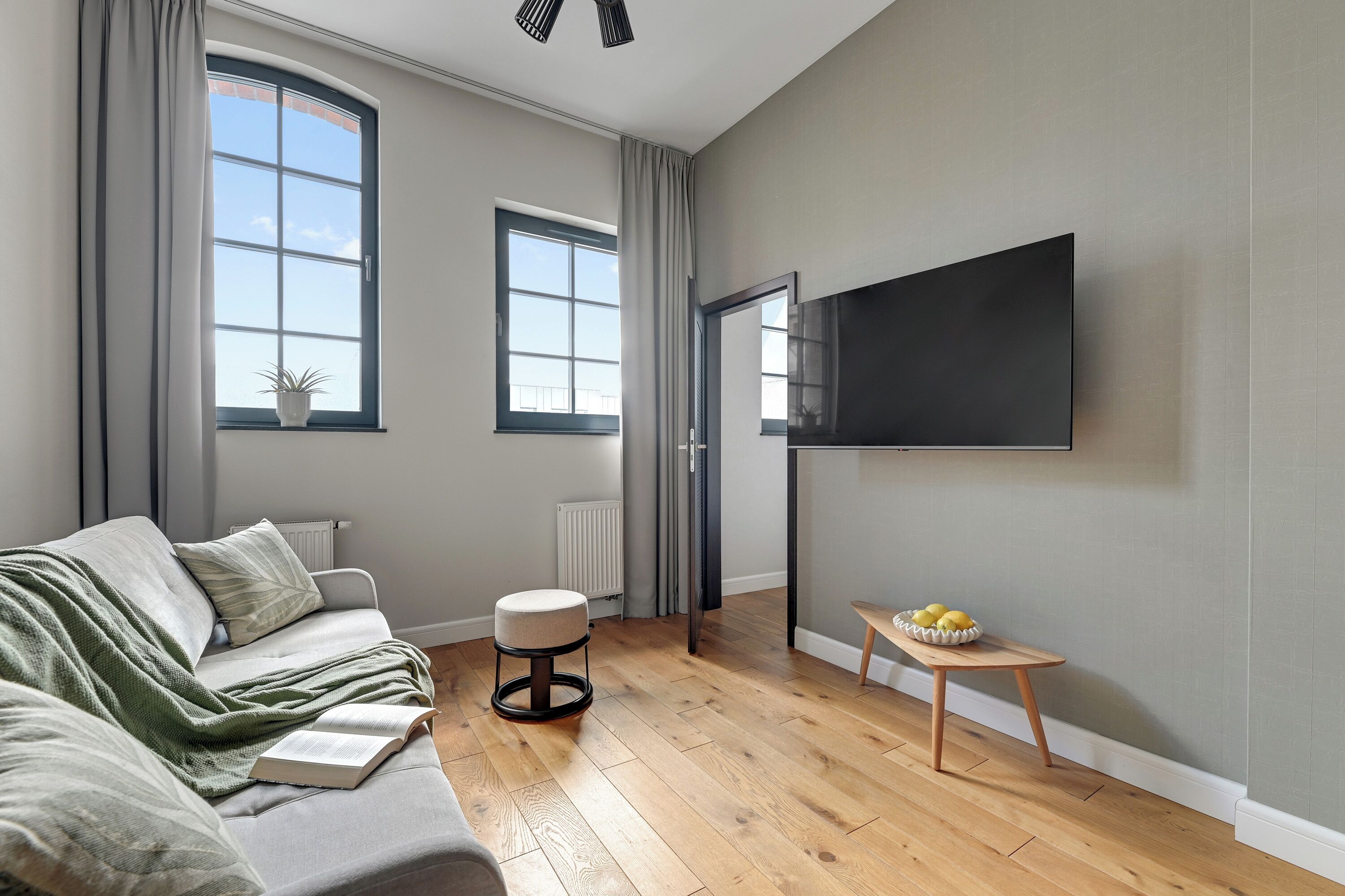 Standard Apartment | Living area | 42-inch Smart TV with cable channels