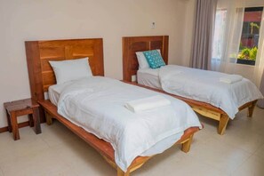 Deluxe Apartment, 2 Bedrooms, Patio | Desk, laptop workspace, free WiFi, wheelchair access - Upland Serviced Apartments (Lusaka)