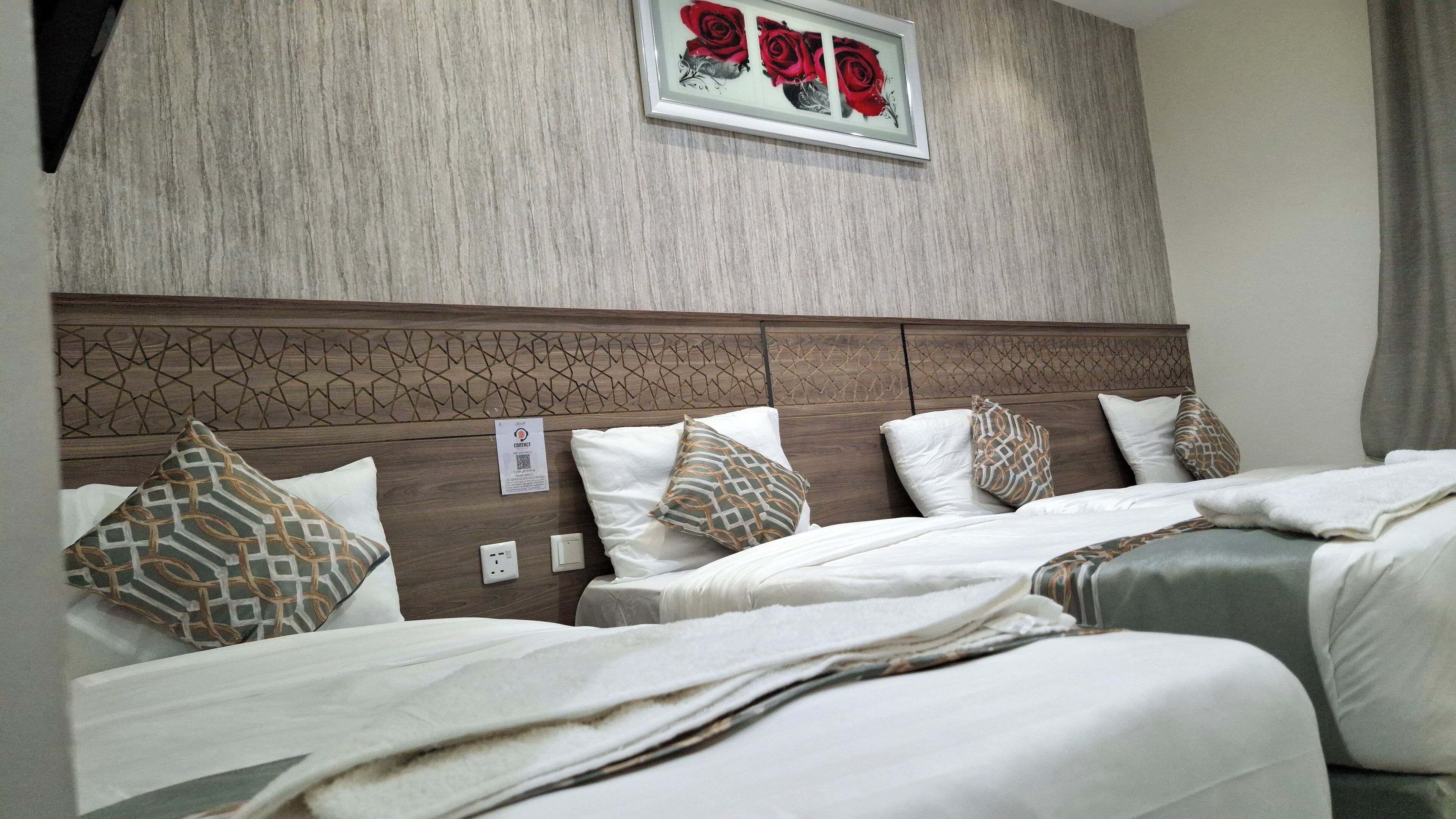 Classic Quadruple Room, City View | Free WiFi, bed sheets