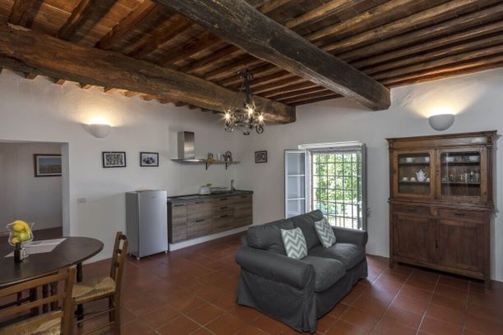 Apartment, Pool View | Living area | Flat-screen TV