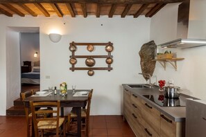 Apartment, Garden View | Private kitchen | Fridge, stovetop, espresso maker, toaster