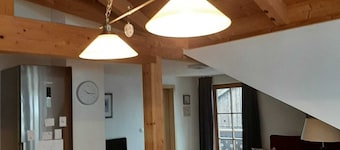 Sunny top-floor apartment with panoramic balcony & mountain views