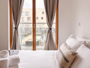 2 dormitorios, tabla de planchar con plancha, wifi y ropa de cama