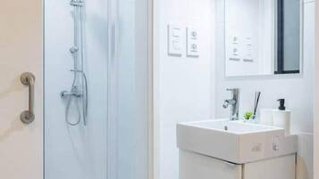 Shower, hair dryer, soap, shampoo