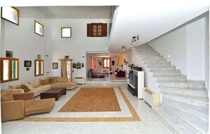 TV, fireplace - Tinos Luxury Two-Storey Villa with Private Pool (Tinos)