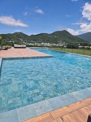 Outdoor pool - New and cozy studio apartment with a pool, close to the beaches of the South of the Island. (Florianópolis)