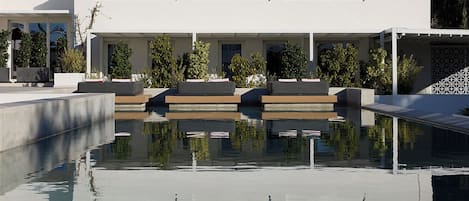 Indoor pool, seasonal outdoor pool, pool umbrellas, sun loungers
