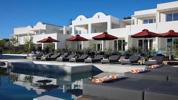 Indoor pool, seasonal outdoor pool, pool umbrellas, pool loungers