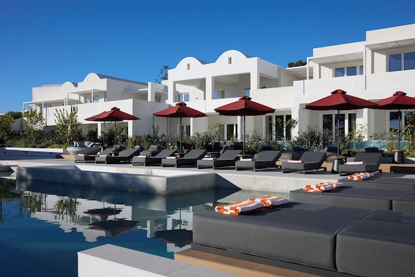 Indoor pool, seasonal outdoor pool, pool umbrellas, sun loungers