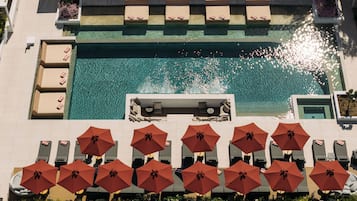 Indoor pool, seasonal outdoor pool, pool umbrellas, pool loungers
