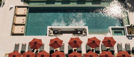 Indoor pool, seasonal outdoor pool, pool umbrellas, pool loungers